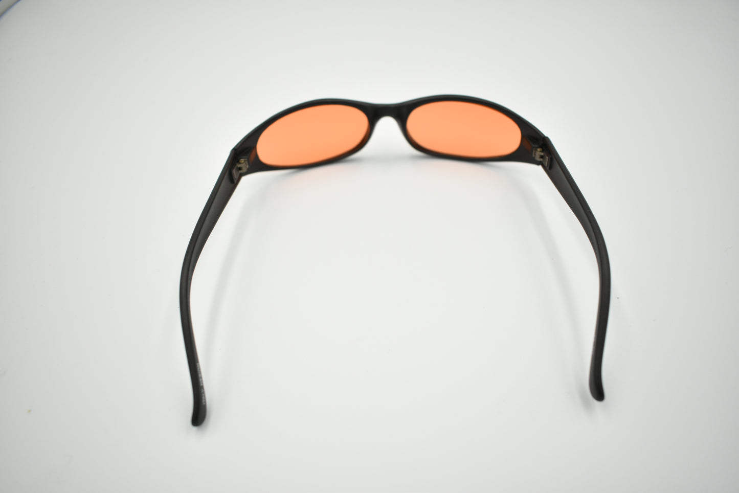 Super Slim Sunglasses Black Oval Frame Modern Style Shades Orange Color Lens