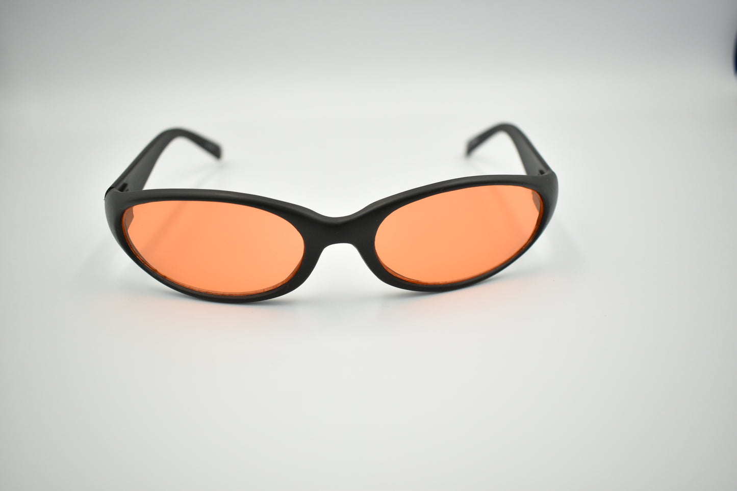 Super Slim Sunglasses Black Oval Frame Modern Style Shades Orange Color Lens